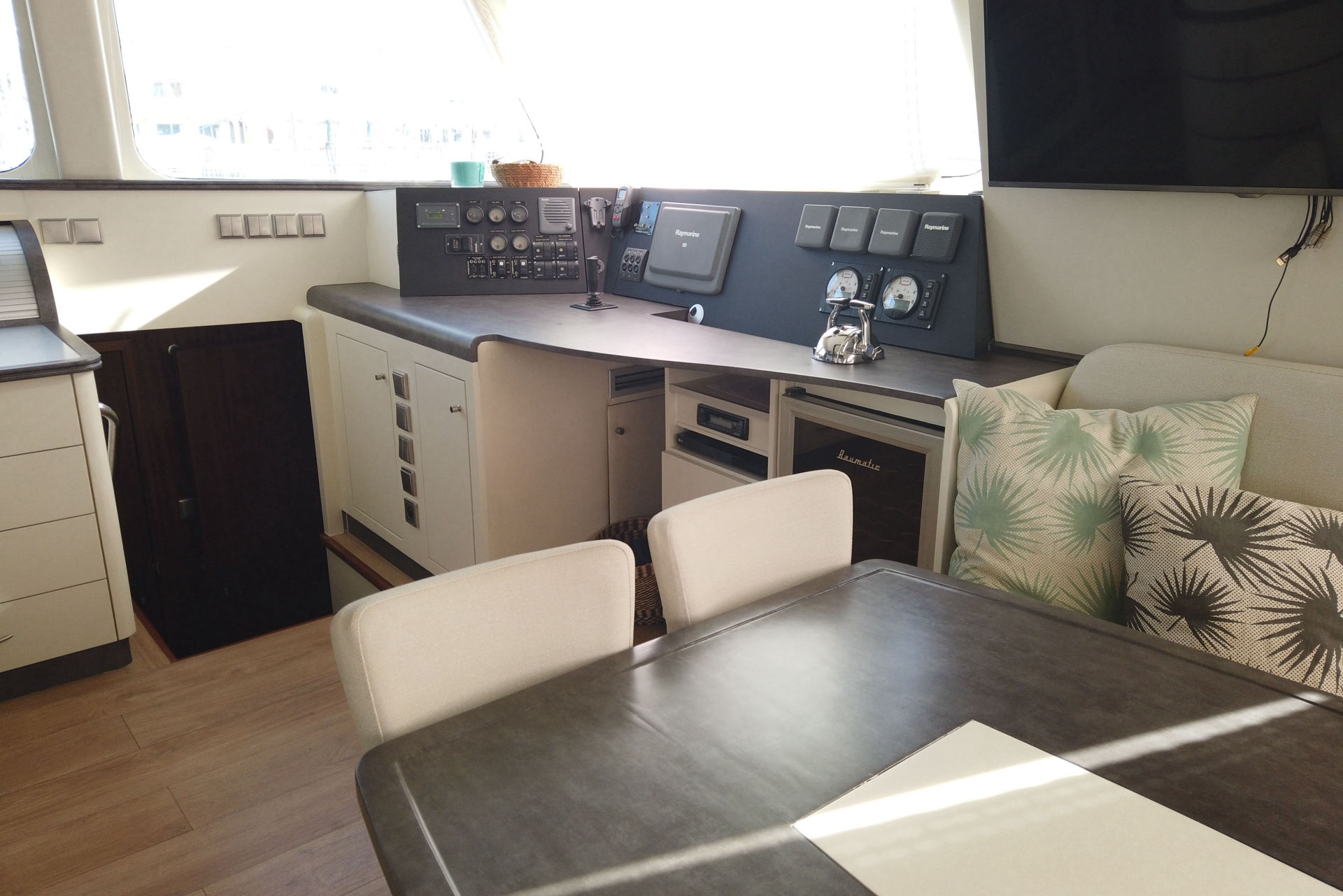 NOOR IV - Sunreef62 - Interior vinyl wrapping and refurbishment on luxury yacht salon furniture